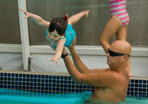 John Dommett and a student practicing diving skills